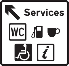 Direction to services with details of the services provided — UK road sign
