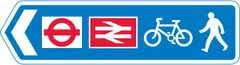 Direction of route to railway and London Underground station for pedestrians and pedal cycles — UK road sign