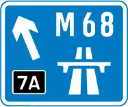 Direction to a motorway at the junction shown, indicating route number — UK road sign