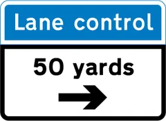 Distance and direction of a system of lane control light signals — UK road sign