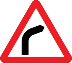 Bend ahead to the right — UK road sign