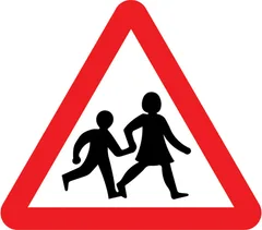 Children going to or from school or playground ahead — UK road sign