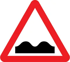 Uneven road ahead — UK road sign