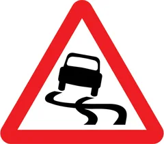 Slippery road ahead — UK road sign