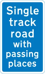Route ahead only wide enough for one line of vehicles, but has passing places at intervals — UK road sign