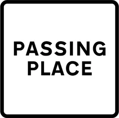 Passing place on a narrow road — UK road sign