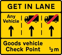 Goods vehicles should get into the left hand lane of a three lane carriageway on the approach to a goods vehicle check point — UK road sign