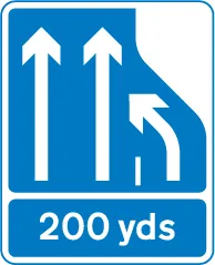 In 200 yards the number of lanes of traffic lanes ahead on a motorway reduces from three lanes to two. Traffic in the right hand lane must move into the lane on the immediate left — UK road sign