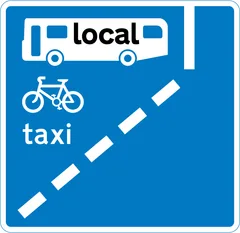 With-flow bus lane which pedal cycles and taxis may also use ahead — UK road sign