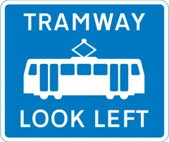 Warning for pedestrians to look out for tramway traffic approaching from the left — UK road sign